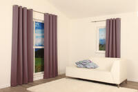 Verduisterend overgordijn met licht glanzend patroon van bladeren