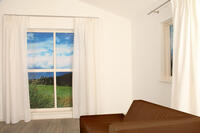 Een nonchalante, dichtere inbetween met een natuurlijke uitstraling door de grovere weving en de toevoeging van linnen