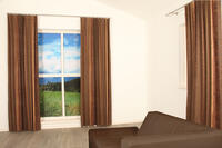 Dit overgordijn valt soepel en heeft een prachtig banen patroon met gouden opdruk