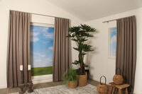 Glosh is een verduisterende overgordijn met een subtiele glinstering en val soepel