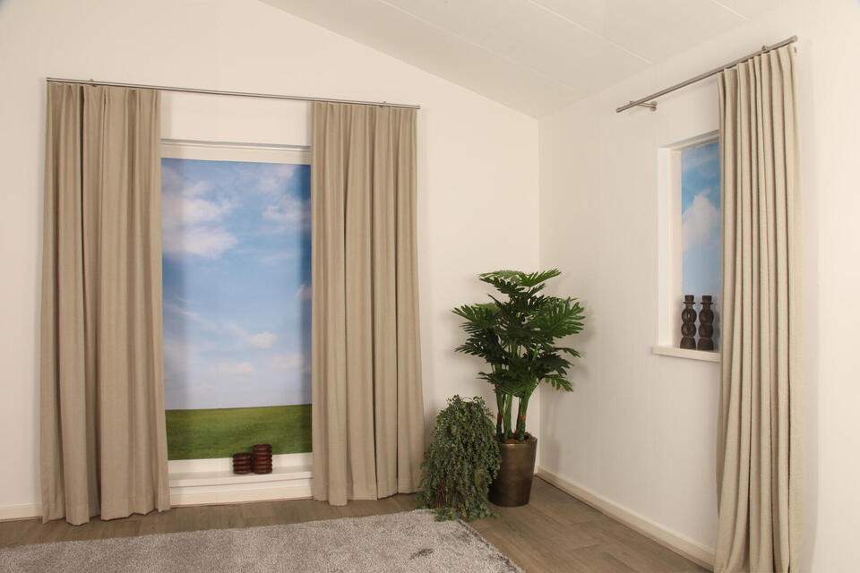 Met overgordijn Oppagne, die een subtiele bouclé effect heeft, creëer je een warme sfeer in huis