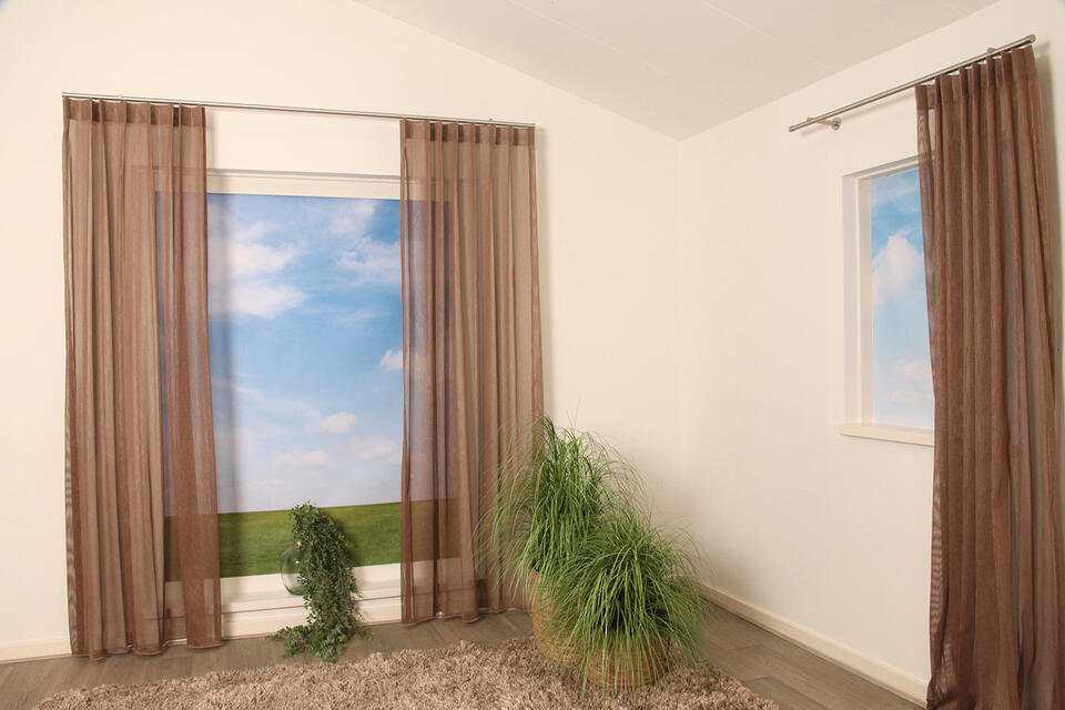 Met vitrage Tredos haal je een echte aanwinst in huis! Deze transparant geeft echt karakter aan je interieur