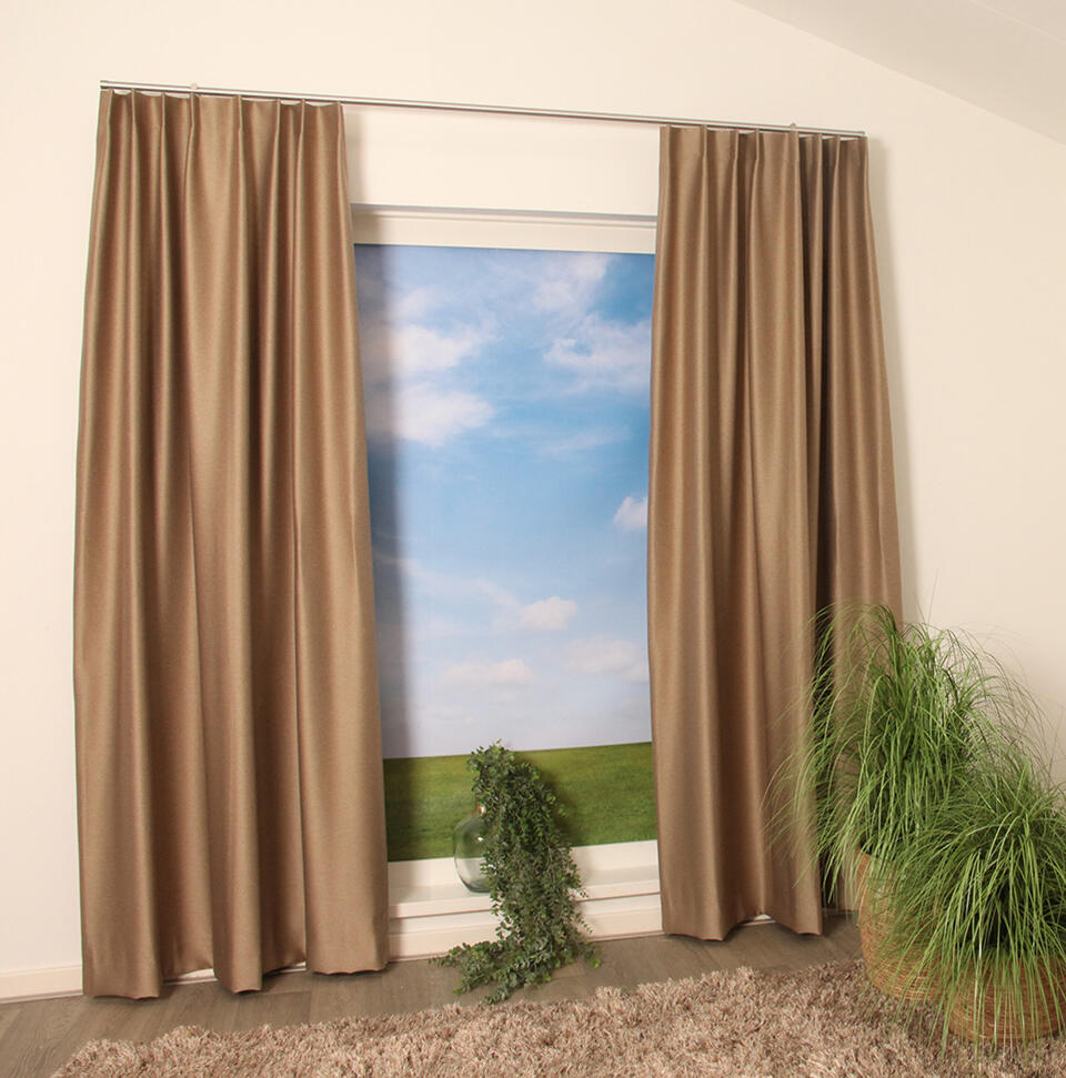 Overgordijn Grinon is een verduisterende weefstof die een warme sfeer in je interieur brengt